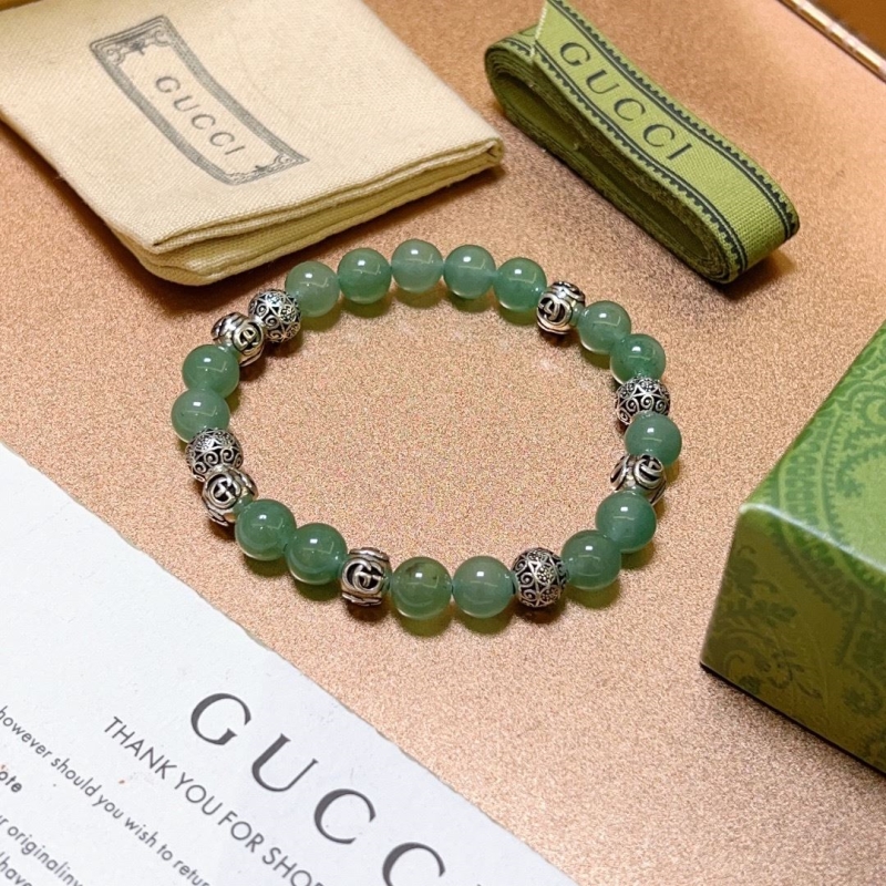 G*u*i bracelets